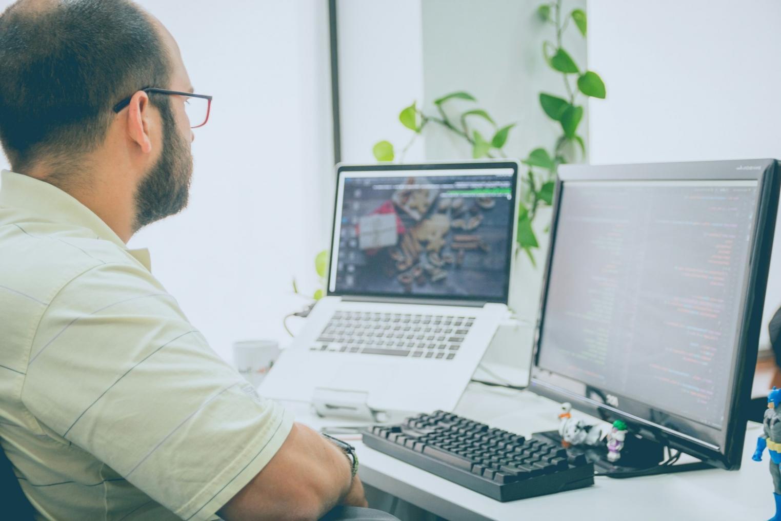 Students working on cloud server configurations in modern computer lab